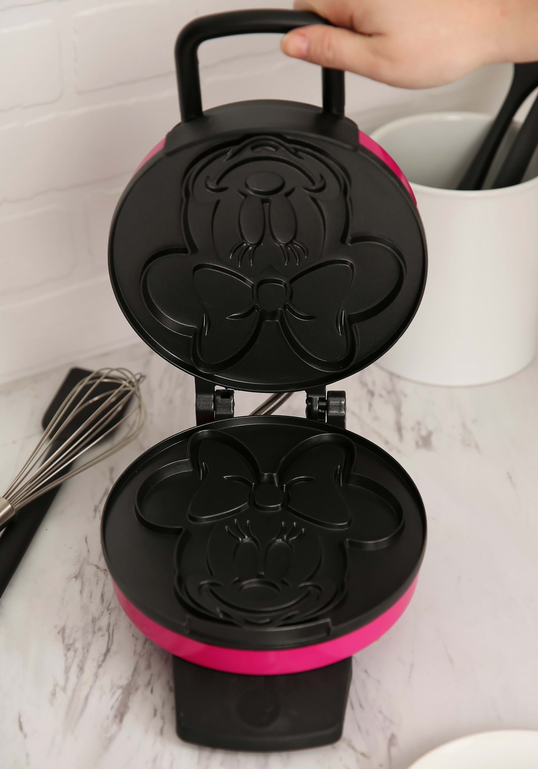 https://images.fun.com/products/44636/2-1-165768/minnie-mouse-face-disney-waffle-maker-alt-1.jpg