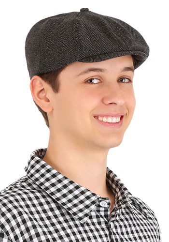 a young man showing how to wear wool newsboy caps with black-and-white checkered shirt 
