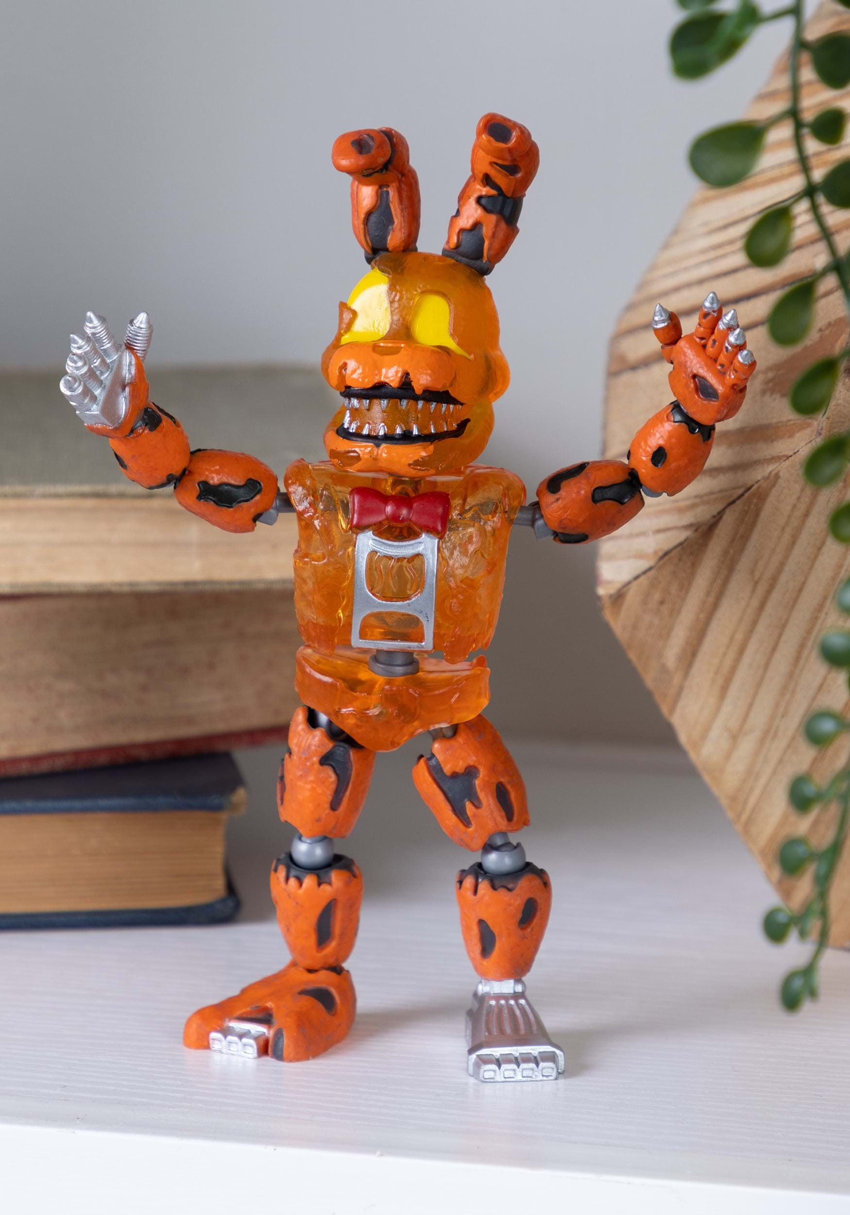 https://images.fun.com/products/75153/1-1/action-figure-fnaf-dreadbear-jack-o-bonnie.jpg